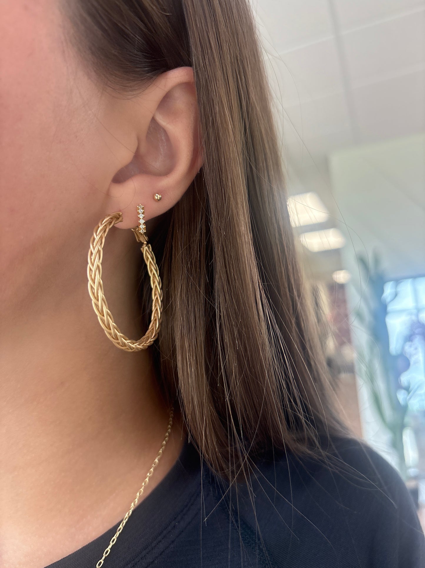 Gold braided hoop earrings