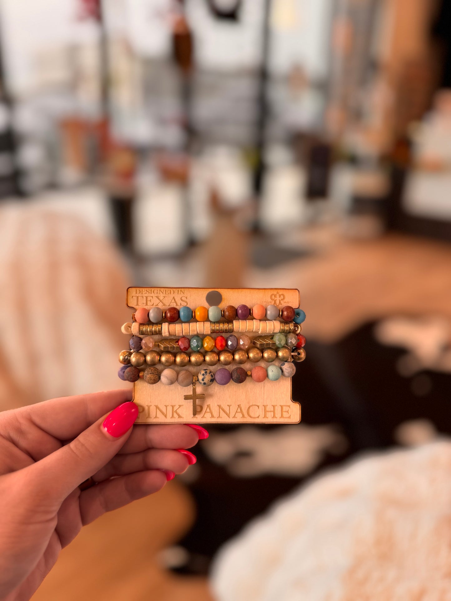 multicolored bracelet with cross detailing