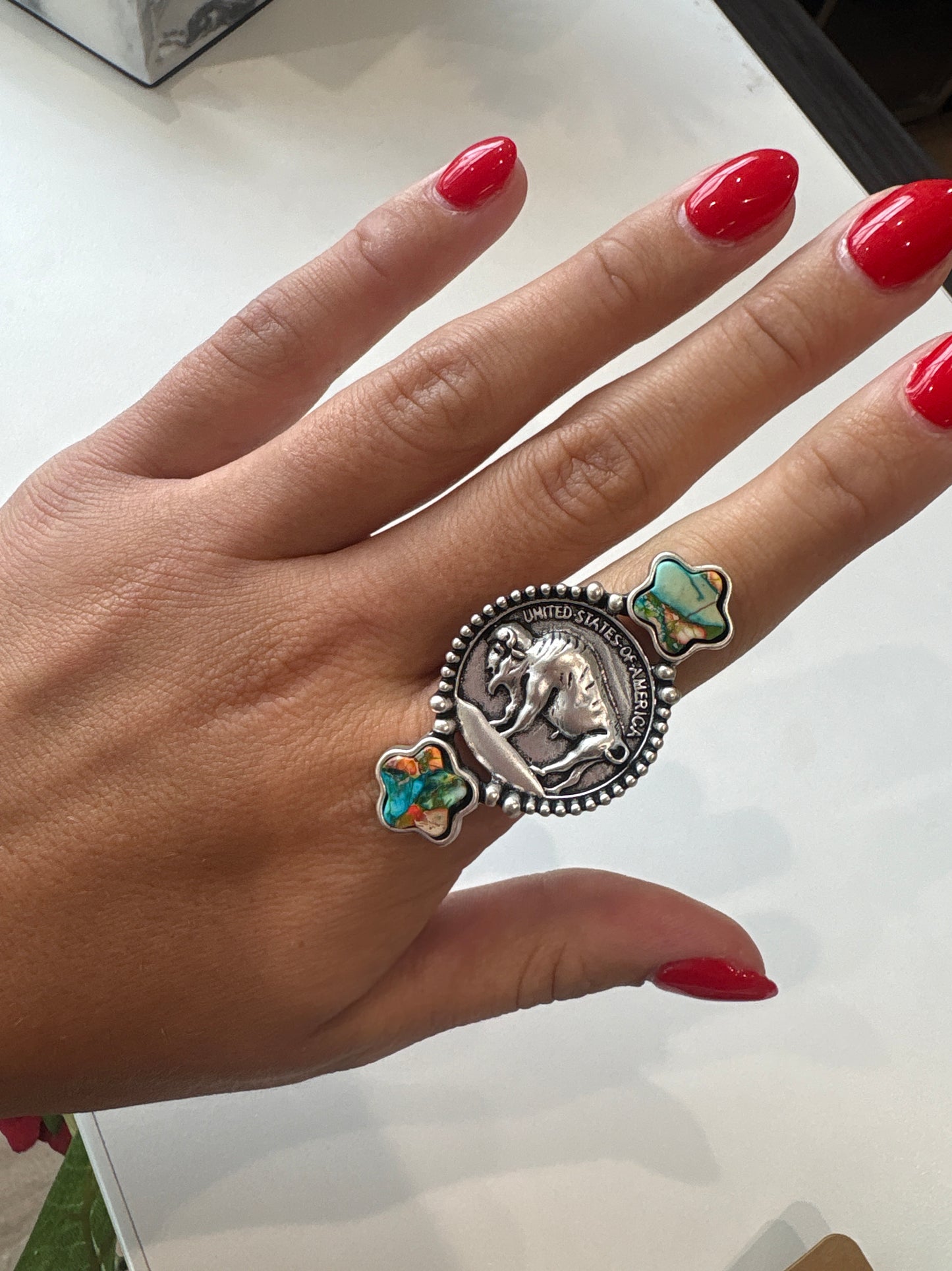 coin ring with star detailing