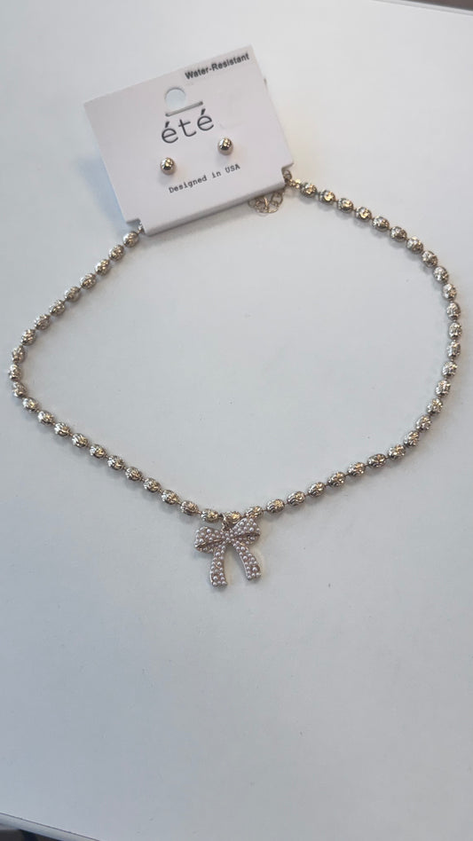 Gold and pink pearl bow necklace with earing set