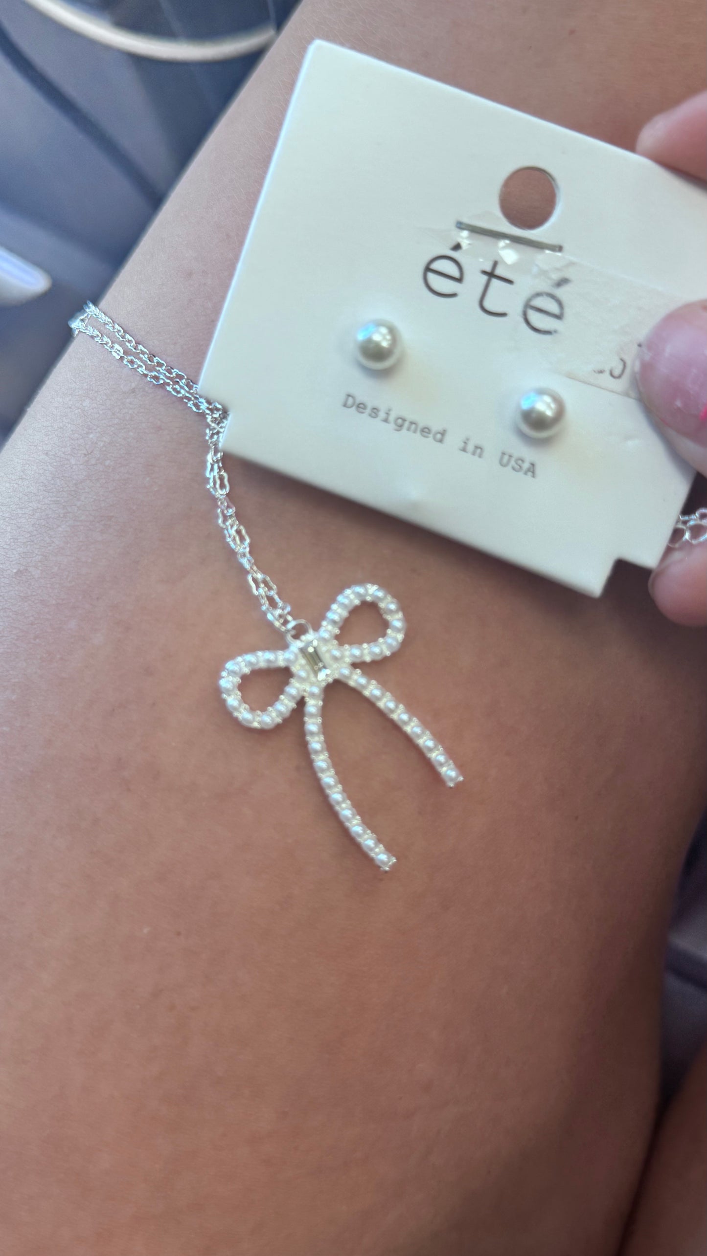 silver and pearl bow necklace with pearl earings